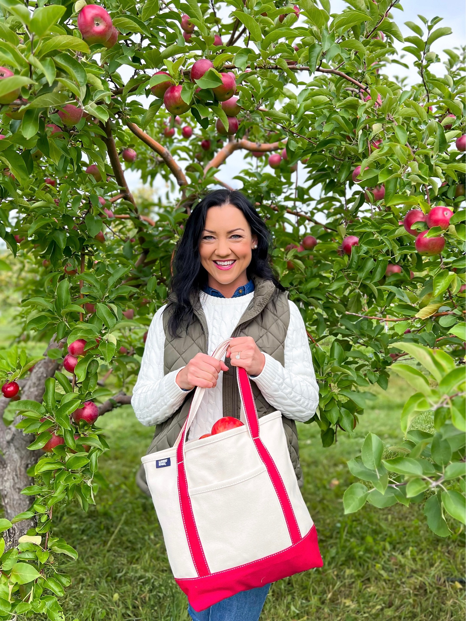 Classic fall outfit on sale! This ivory cable knit sweater and green vest are both on sale. Layer them together with jeans and tall boots or pair them separately to create tons of autumn and winter outfits! Very affordable and excellent quality. 

Cable knit sweater: fits a little big, i sized down to XS and it fits perfectly 
Quilted Vest: Also runs a little big, I have plenty of room in the XS to layer it on top of thick sweaters

Tote bag, apple orchard outfit, pumpkin patch outfit, mom style, affordable fall fashion, sale, timeless, classic, preppy, Lands’ End, ootd #classicstyle #momstyle #sale #sweater #vest 

#LTKsalealert #LTKfindsunder50 #LTKSeasonal