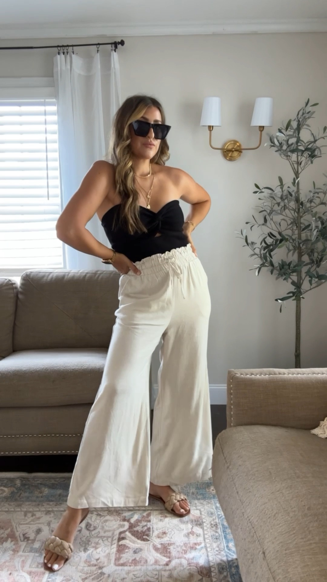 Amazon outfit. Loving this black strapless cutout top paired with these comfy linen pants! Wearing a medium jn both!

#LTKunder50 #LTKtravel #LTKstyletip