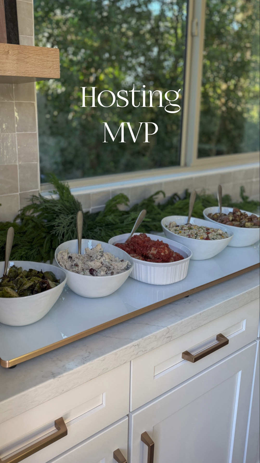 Tired of food being cold 5 minutes after serving? Nothing is more frustrating when it comes to serving guests or family. This electric warming tray solves that problem & is a true hosting essential for family dinners, parties & everything in between. I have the (40” x 12”)  & it fits up to 5 serving dishes while keeping each one perfectly warm from appetizers through dessert. Sleek, functional & available in multiple sizes with white or black finishes. It’s the hosting upgrade you didn’t know you needed.

electric warming tray, food warmer for parties, buffet warming tray, extra long food warmer, holiday hosting essential, countertop food warmer, glass warming mat, adjustable temperature warming tray, white warming tray, black warming tray, Thanksgiving buffet warmer, Christmas dinner warmer, kitchen appliance for entertaining, sleek food warming tray, large warming mat, modern serving tray warmer, food heating mat, holiday entertaining must have

#LTKSeasonal #LTKHome #LTKHoliday