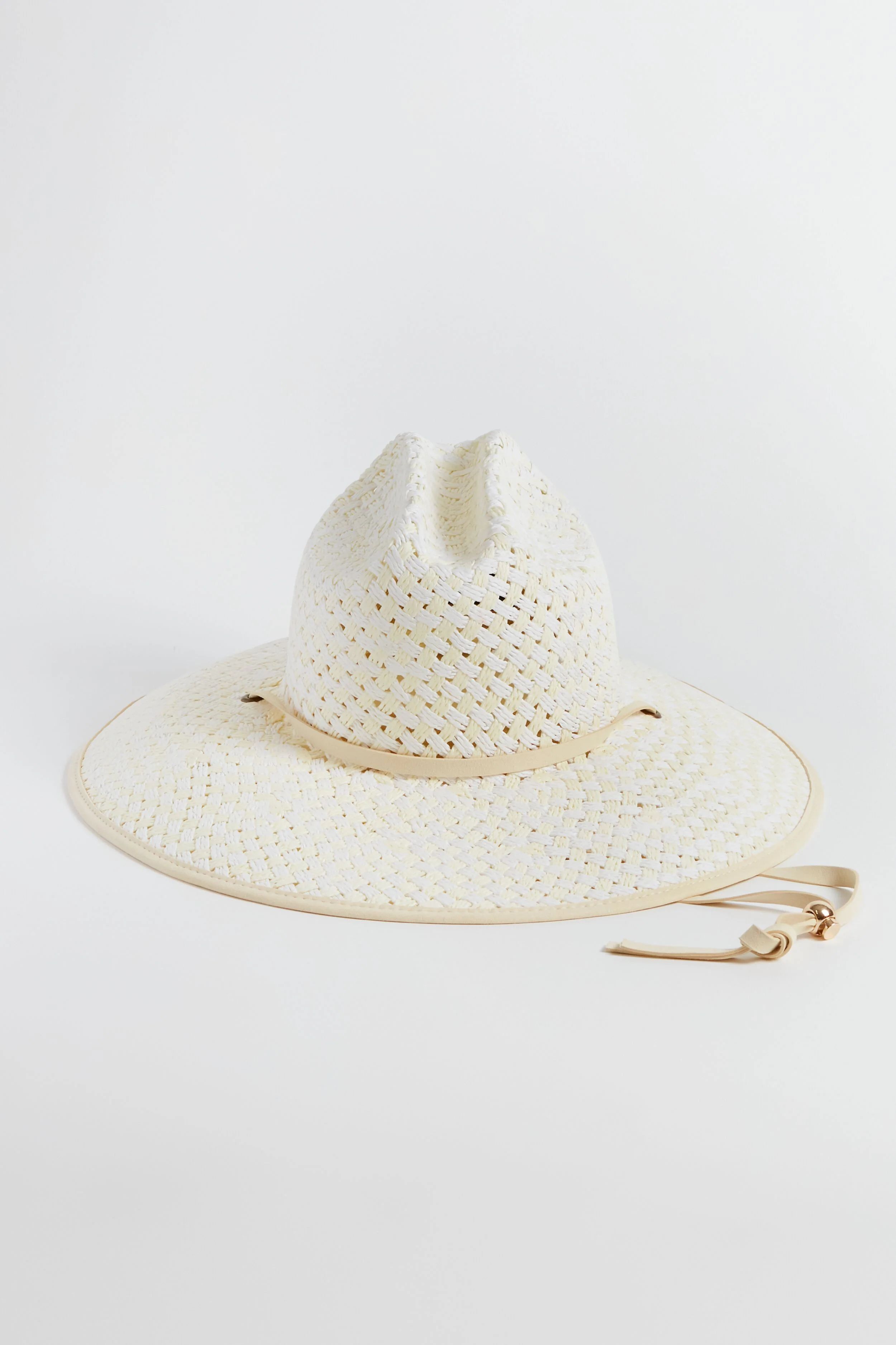 White Washed Straw Checkered Hat 
                Lele Sadoughi | Tuckernuck (US)
