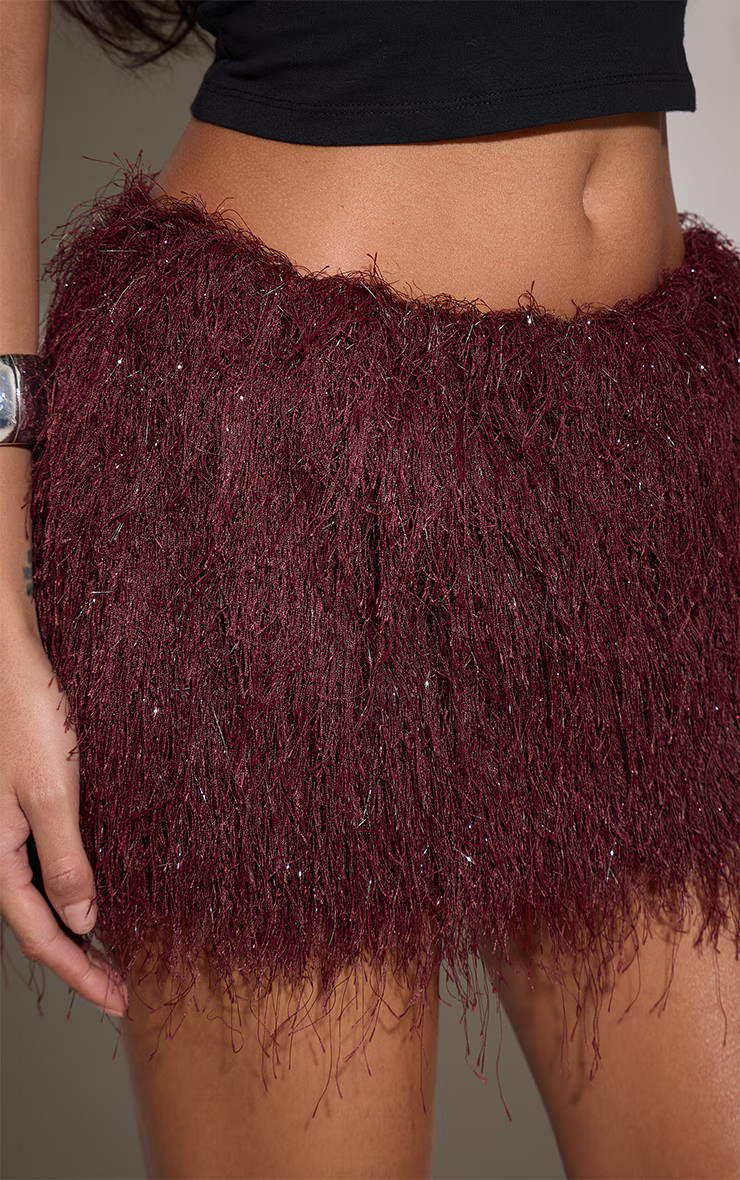 Burgundy Metallic Fringe Mini Skirt | PrettyLittleThing UK