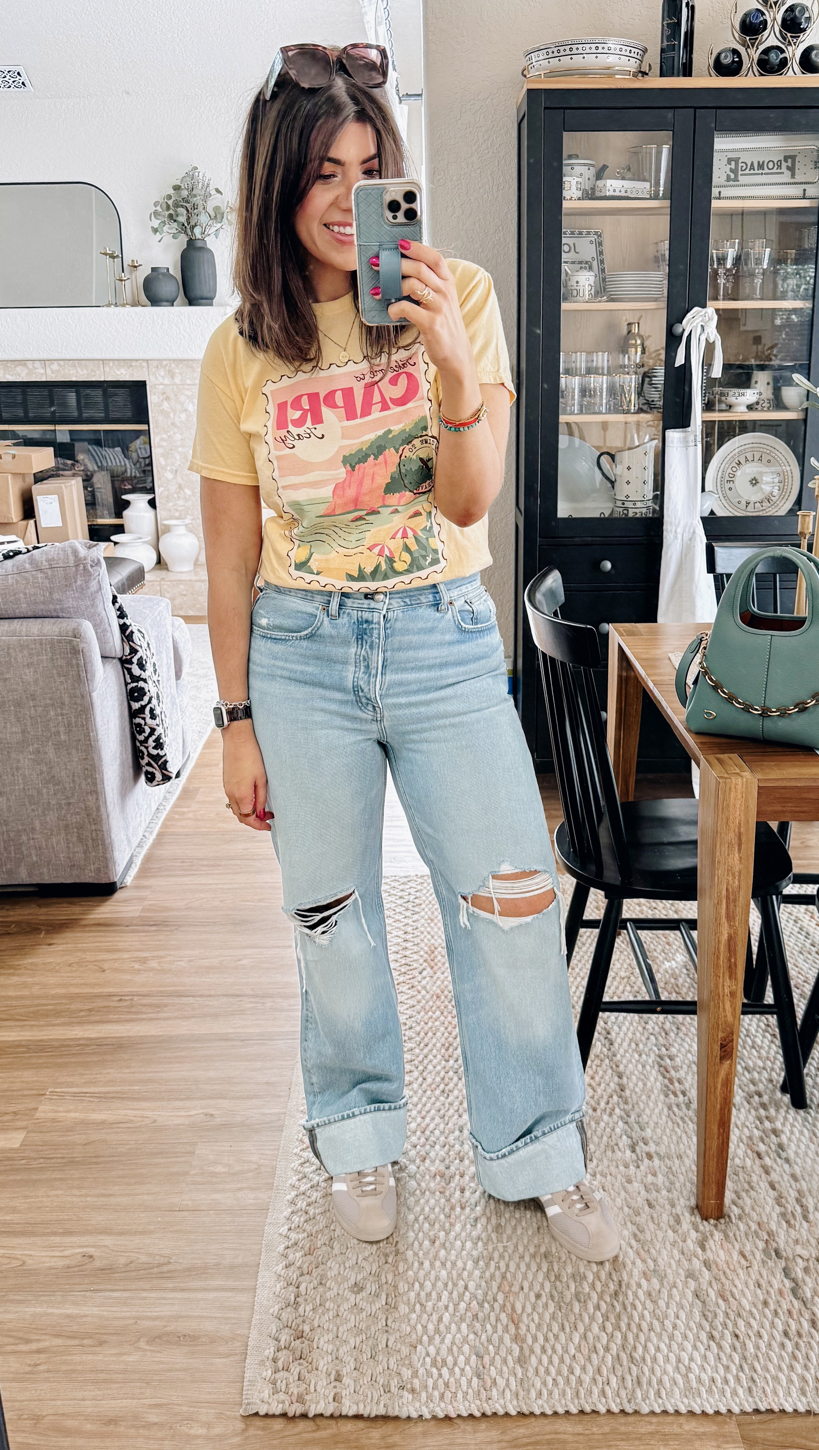 Sized down to a small in graphic tee
In an 8 regular relaxed jean

#LTKMidsize #LTKSeasonal #LTKOver40