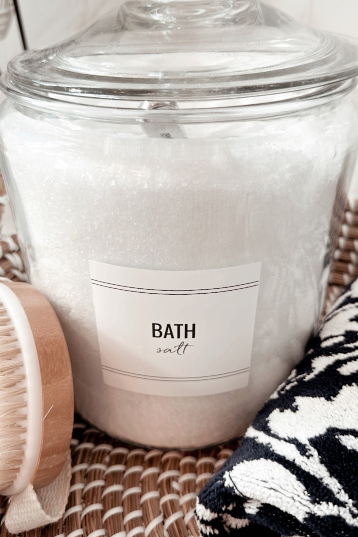 Turn your mundane bathroom into a spa experience with these chic glass bins. 