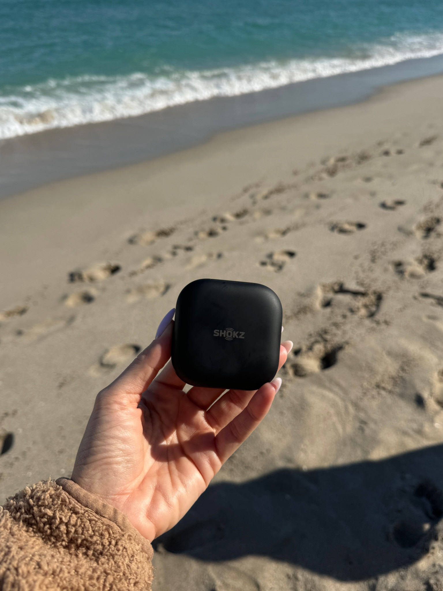 Chilly beach walk with my @shokzusa #OpenFit headphones. Black Friday sale ends soon !!! Makes such a great gift for anyone on your list 🖤 shop now and get your shopping done so you can actually relax this season. They are soooo comfortable. 

#LTKSaleAlert #LTKGiftGuide #LTKCyberWeek