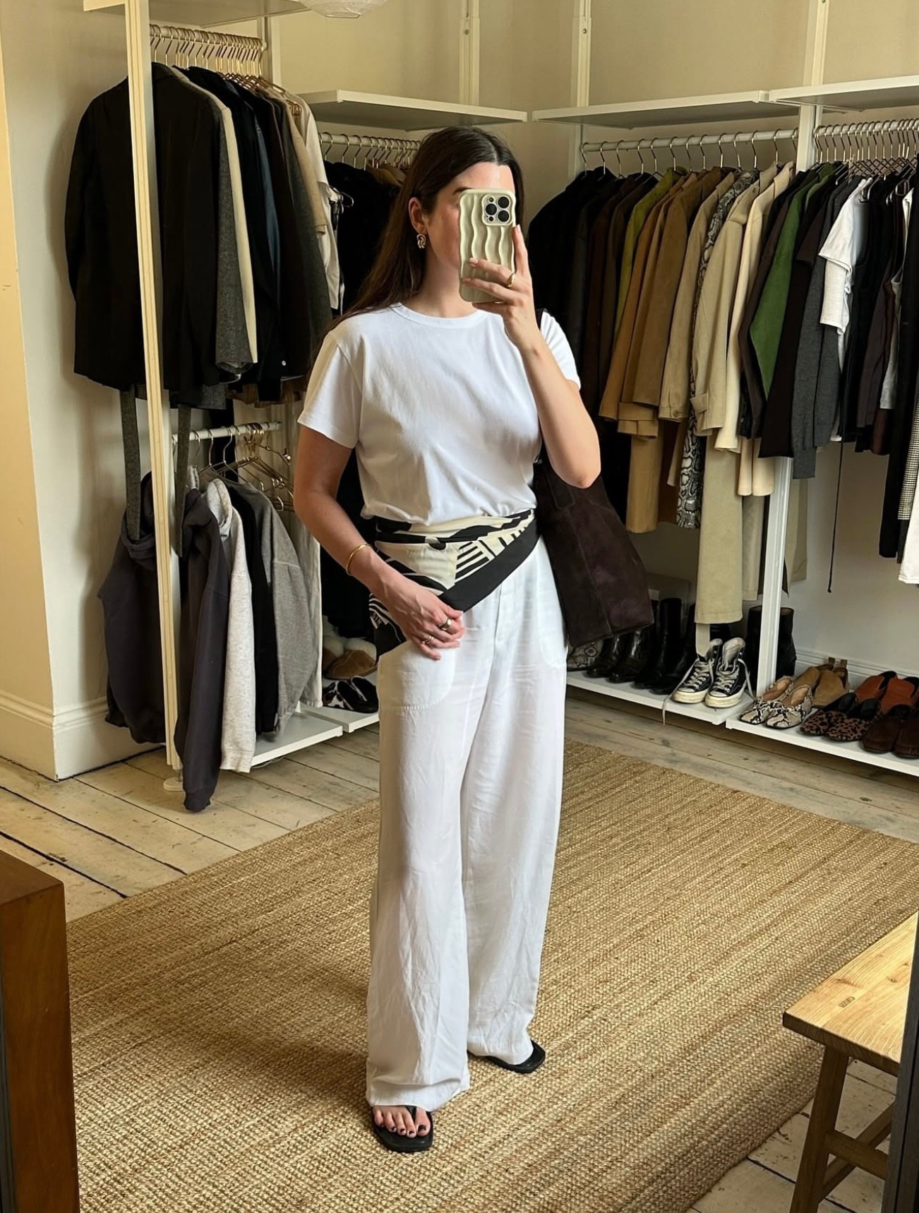 An all white base elevated with a fun silk scarf tied around the waist. Perfect for casual lunches and city strolls.

#LTKstyletip #LTKsummer