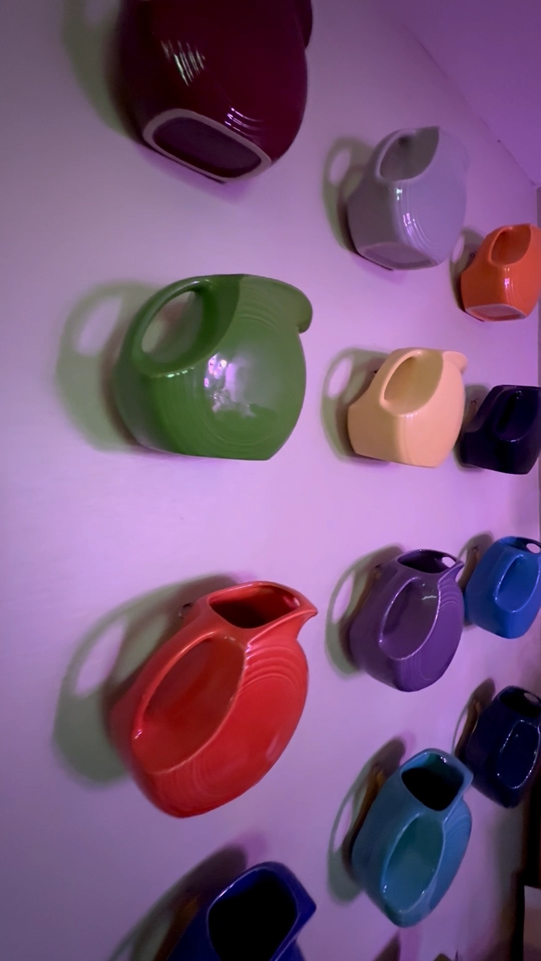 Who says pitchers are just for liquids? I’m in love with this collection of Fiestaware disc pitchers which are hanging on the wall.

First of all, how cool is it that you can hang a bulky, breakable item like this on the wall? But then grouping a bunch of them together (perfectly spaced!) to create such a sculptural display in a dining room. The pops of color and mid-century vibe are so welcoming. 🌈

And as a mosaic artist, this type of creative ‘wall art’ inspires me….especially when it’s in a home. Plus, I’ve made a number of mosaics from broken Fiestaware pieces so I always have a soft spot in my heart for this brand. For mosaic tips, tutorials + inspiration please visit my YouTube channel: YouTube.com/julieweilbacher. Follow @julieweilbacher on Instagram for all things mosaic art.

#pitcher #fiestaware #kitchenessentials #midcenturymodern #discpitcher #diywallart #diningroomwallart #kitchenwallart #ceramicpitcher #hostingessentials

#LTKFindsUnder100 #LTKFindsUnder50 #LTKHome