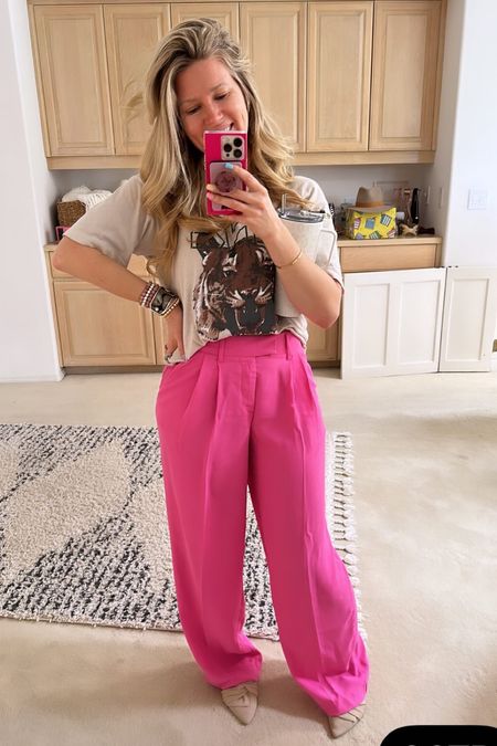 This cute look is perfect for spring! My favorite Anine Bing tee with hot pink trousers!? Yesss! Also, my shoes are actually slip on mules. So comfy for the work day! Don’t be afraid to be bold with your colors and patterns. #ootd #aninebing #target 

#LTKfit #LTKstyletip #LTKunder100