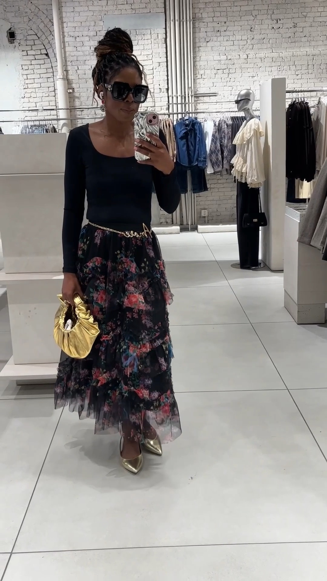 Day six and the final day of New York Fashion Week. I wanted to switch things up a little, so instead of making the day only about shows, I spent some time checking out a few of the pop-ups happening around the city.

For my look, I went with a black top and floral skirt, then added gold accessories to pull everything together. Still very much my style, but easy enough for walking around NYC and seeing where the day took me.

I added my look and a few similar pieces below if you want to check them out.

#LTKdayinmylife #LTKootd #LTKU
