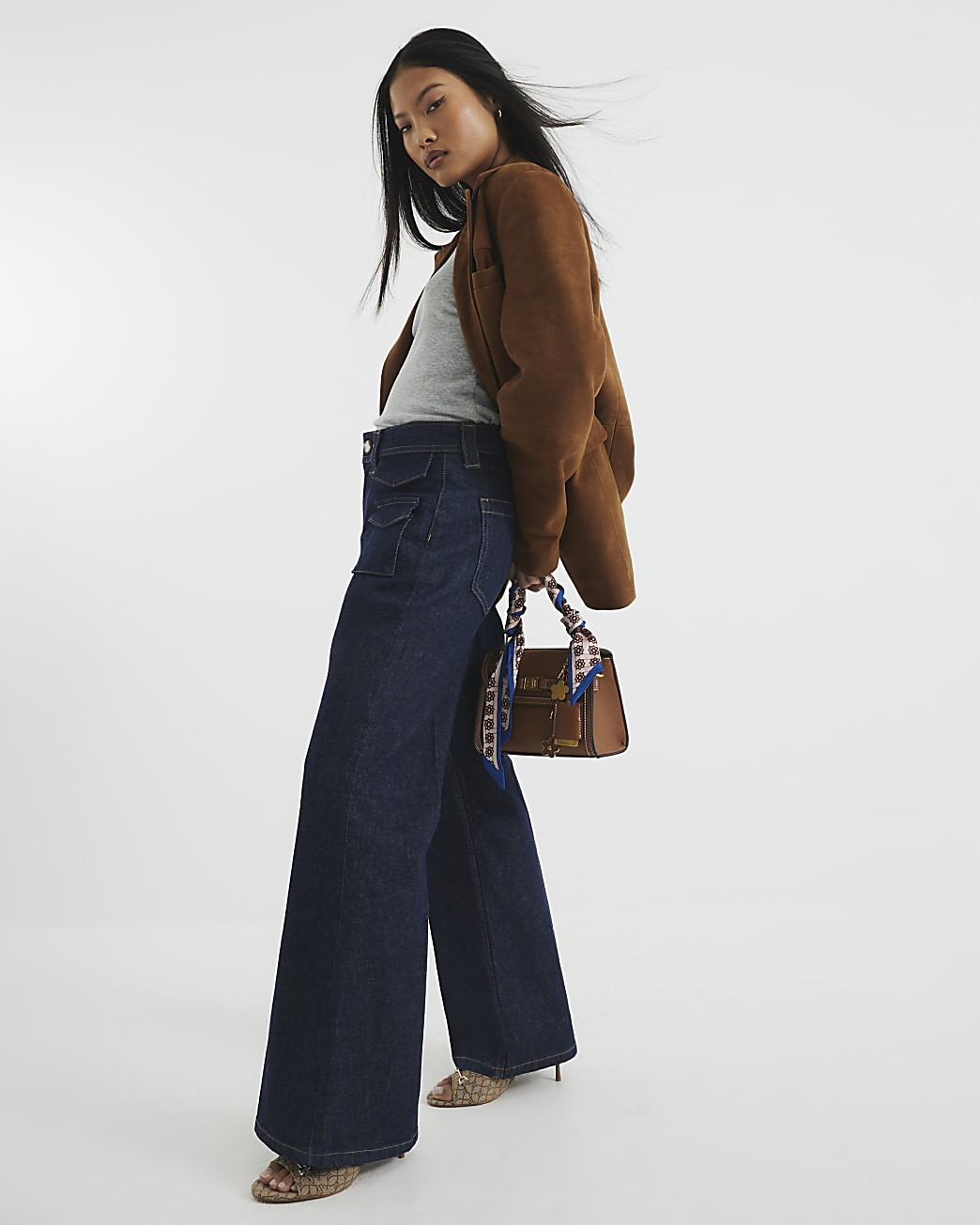 Petite Blue High Rise Relaxed Flare Jeans | River Island UK & IE