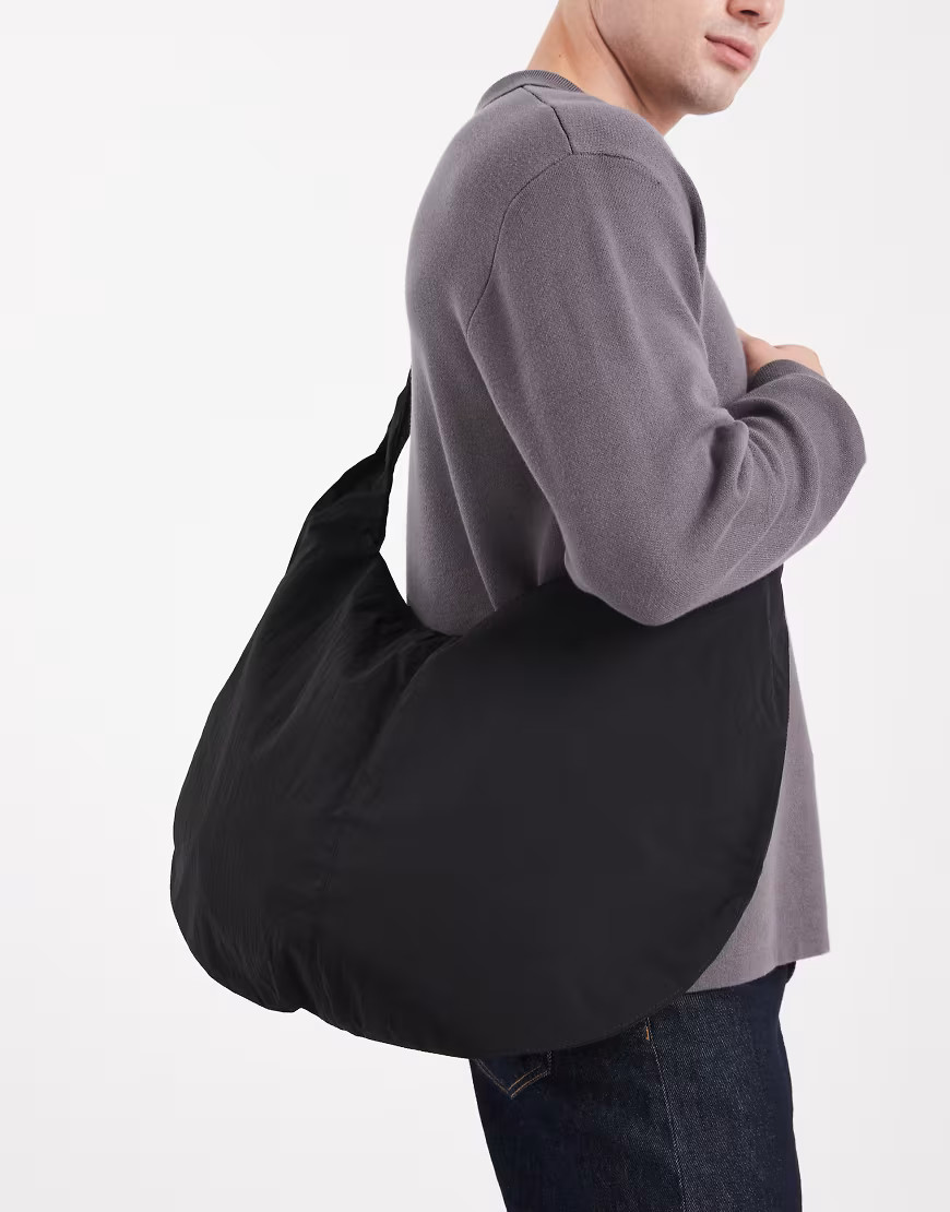 ASOS DESIGN sling bag in black | ASOS (Global)