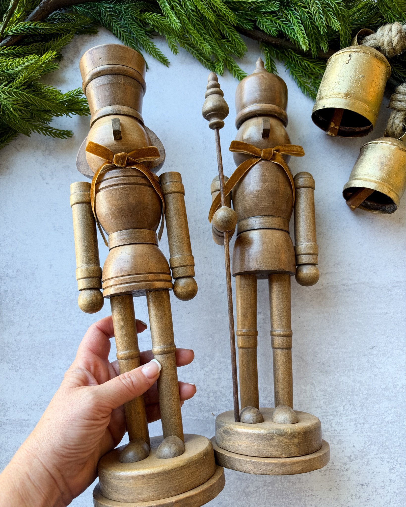 These wooden nutcrackers have such a classic look!! I love the natural wood mixed with gold bells and greenery for Christmas! #holidaydecor #amazonholiday 

 #LTKdayinmylife #LTKSeasonal #LTKHome