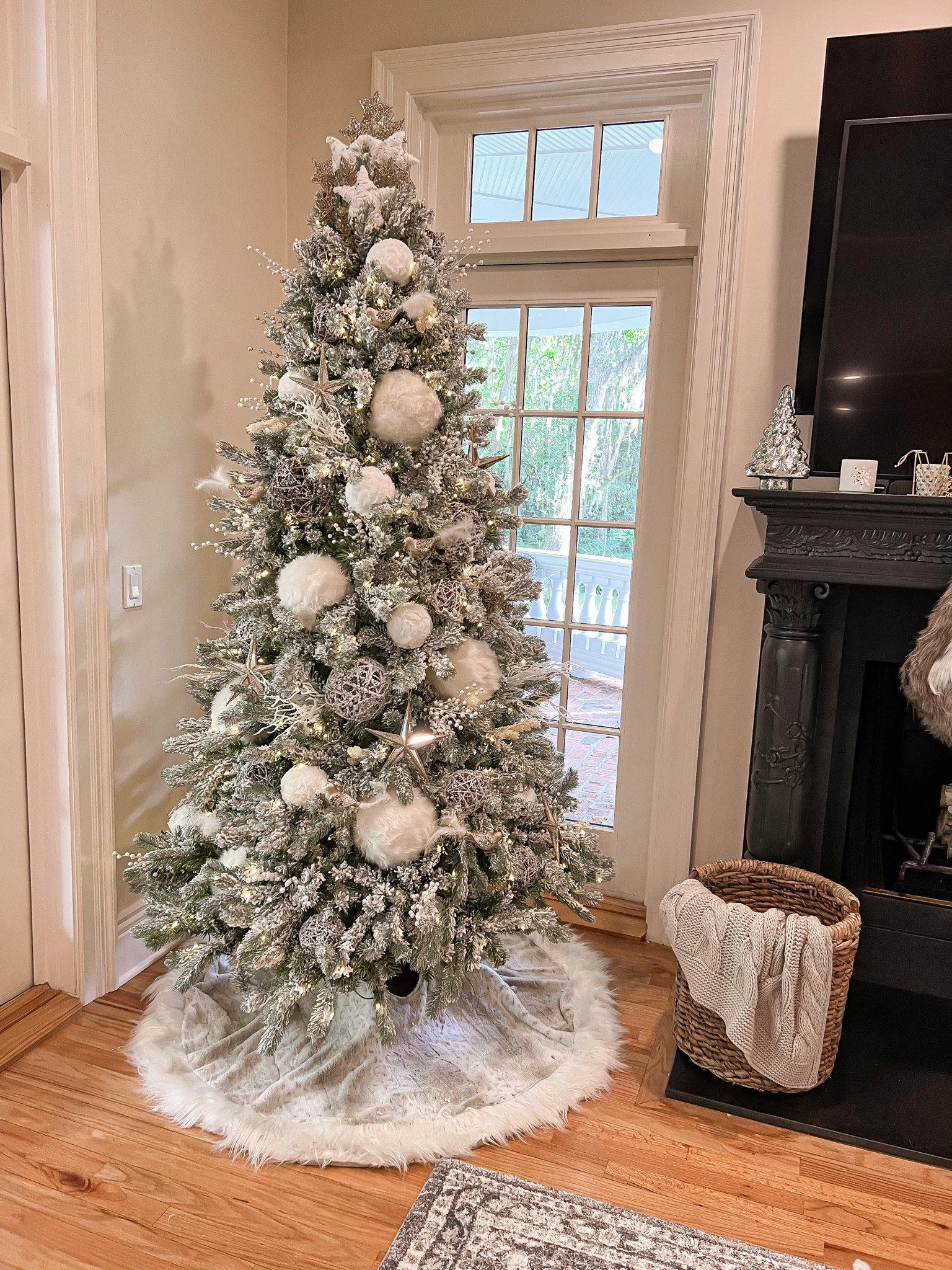 7.5 Ft king of Christmas tree 
Target holiday home decor 
Living room couch, throw pillows, knot blanket, Christmas decor 

#targethome #holiday #christmas #homedecor #laurabeverlin 