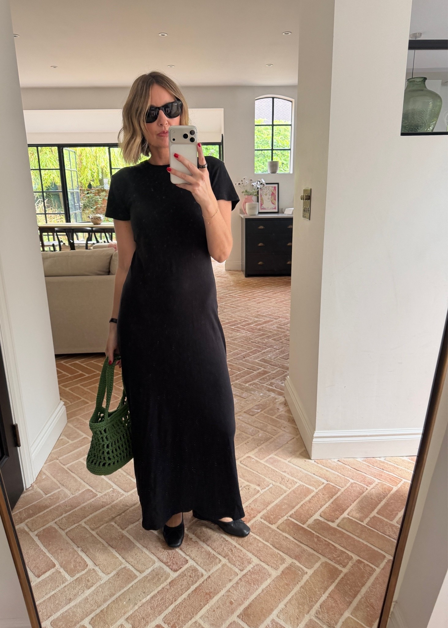 black jersey maxi dress, t-shirt maxi dress, cotton column dress, green crochet bag, woven market tote, black ballet flats, black sunglasses, effortless summer style, weekend uniform, easy throw on dress, monochrome outfit, quiet luxury, elevated basics, minimalist off duty look, ltkstyletip, ltkseasonal, ltksummer, ltkfindsunder100, outfit inspo, capsule wardrobe essentials

#LTKsummer #LTKdatenight #LTKdresses
