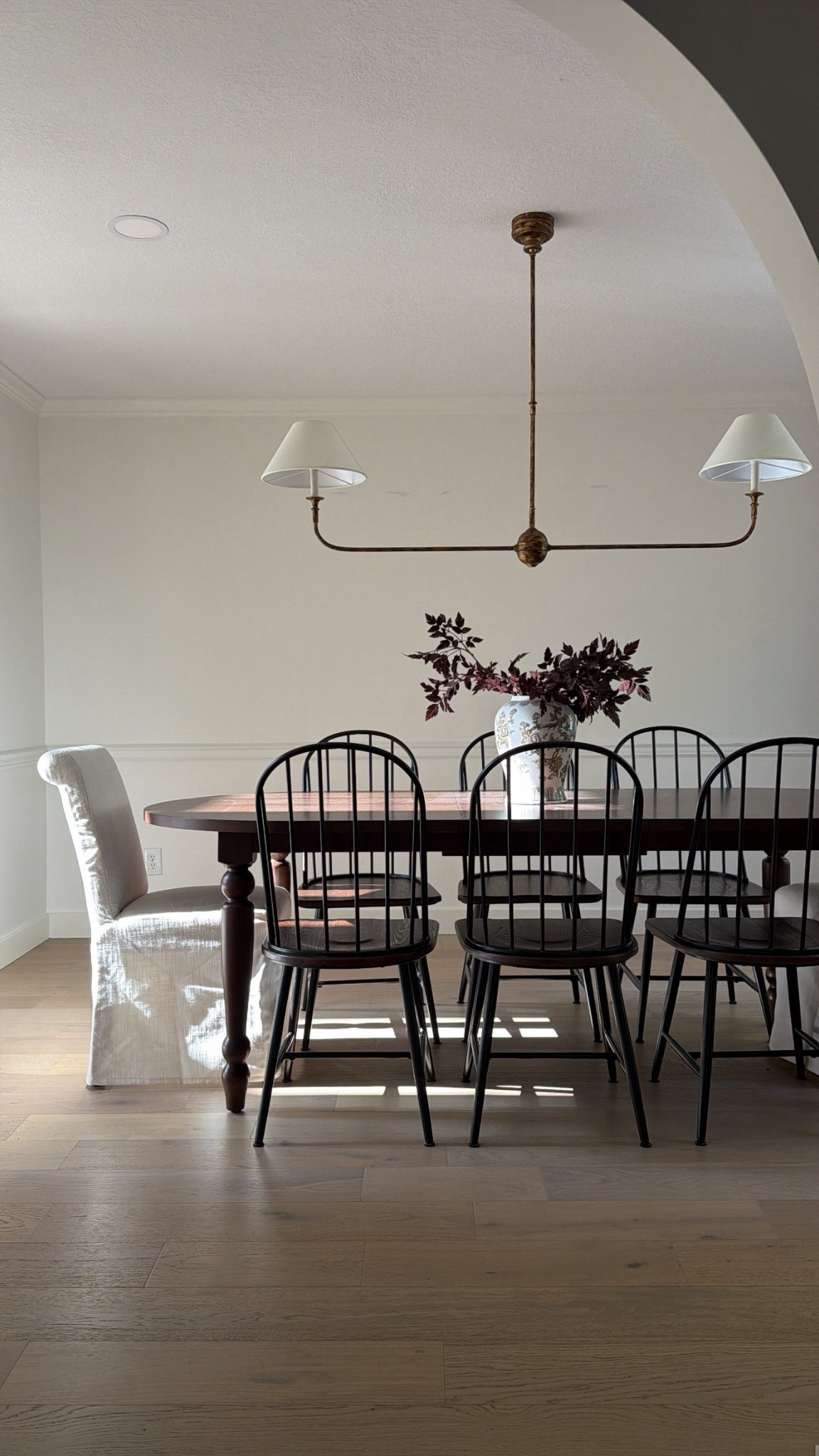 A still shot of my new dining room set up! 

I love these iron arch chairs from Wayfair- I’ve had 2 for years and they basically look brand new still, so I just added four more that are slim fitting for a long table! 

#LTKHome
