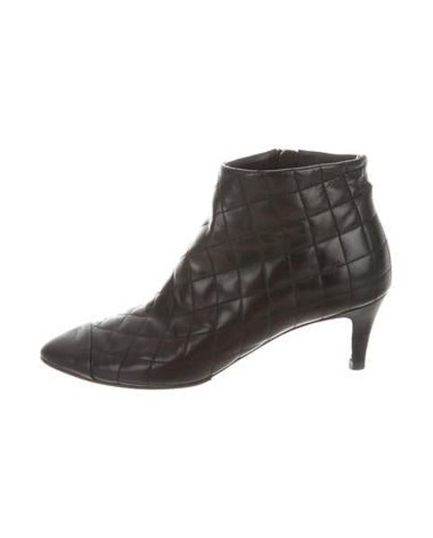 Chanel Quilted Cap-Toe Booties Black | The RealReal