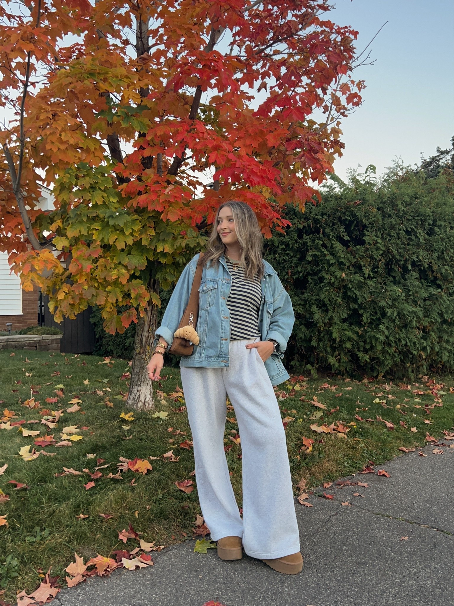 Comfy fall outfit! Wearing size L in the sweatpants and striped tee. Sized up to XL in the denim jacket for an oversized fit. I’m a 9.5-10 shoe and wear a 10 in the Uggs

#LTKfall #LTKsale #LTKstyletip