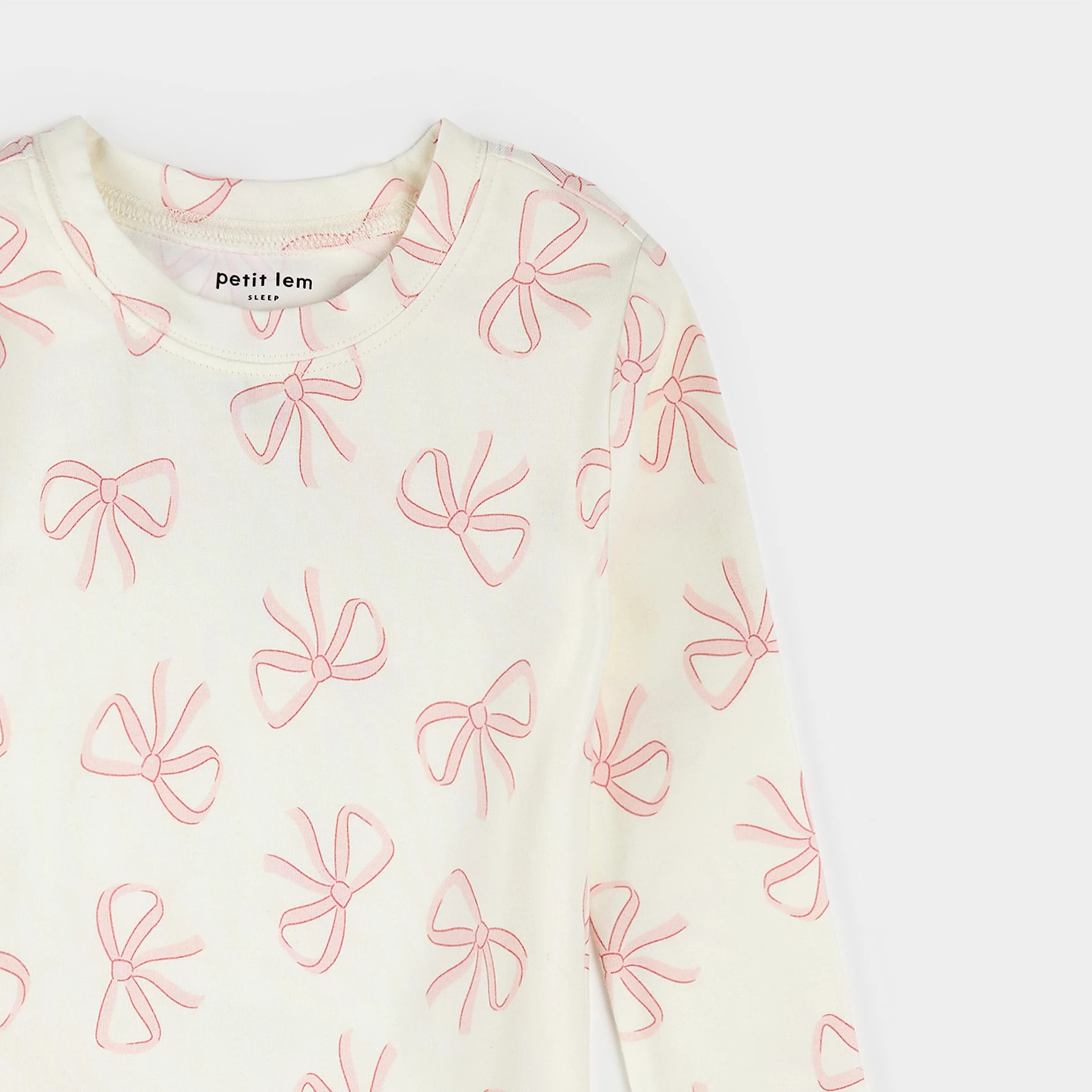 Bows Print on Ivory PJ Set | Petit Lem