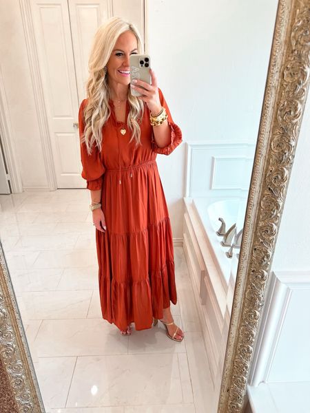 This rust burnt orange maxi dress is perfect for fall. Runs tts wearing size small. Love the fit and ruffle details. Is also lined. 

#LTKfindsunder100