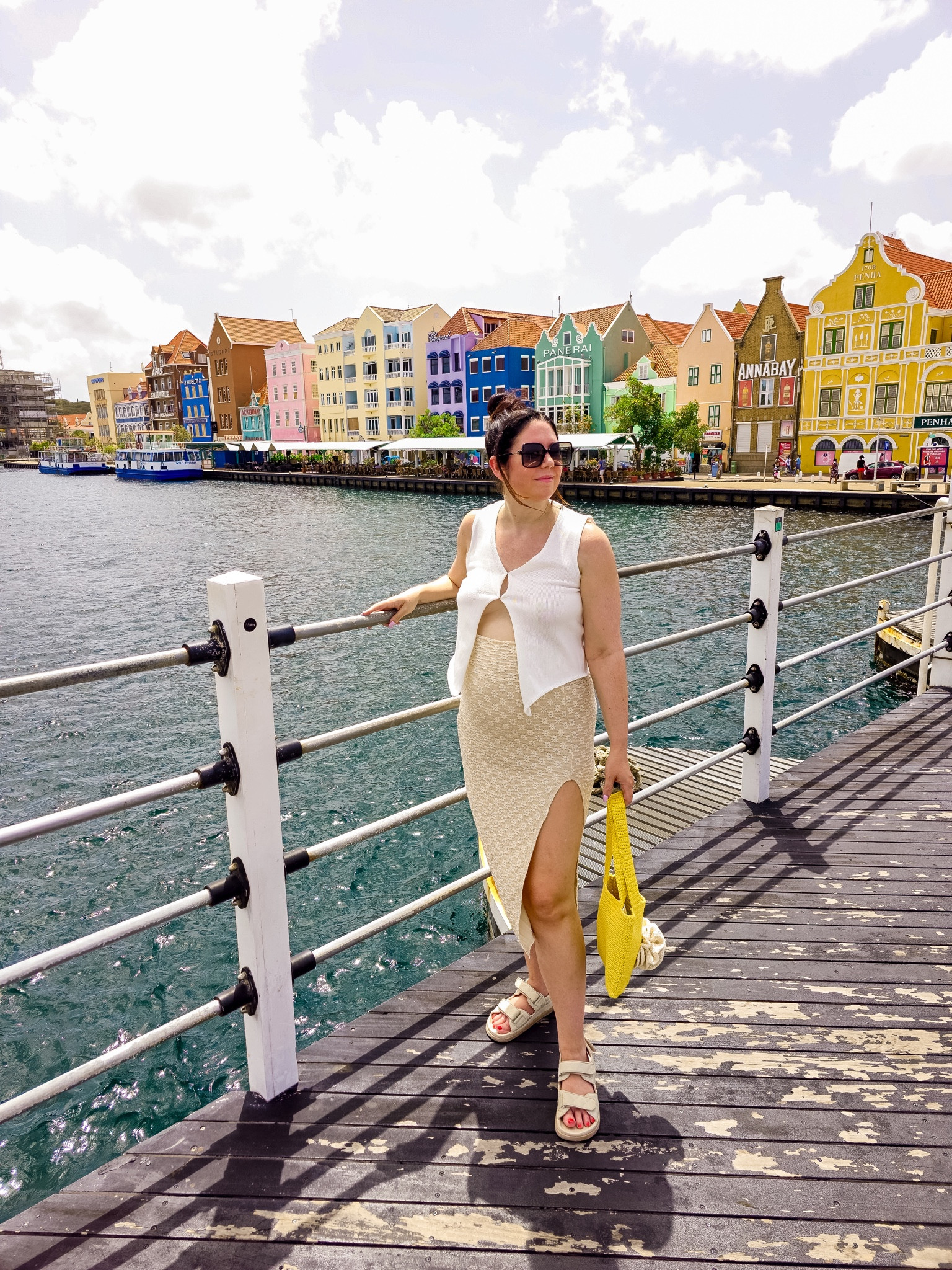 Bump friendly outfit, maternity, travel, sightseeing, casual day outfit, dad sandals, summer sandals, sweater tank, floral embroidered tan midi bodycon skirt, yellow flower crochet bag

#LTKbump #LTKSeasonal #LTKstyletip