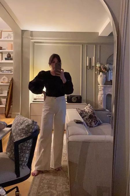 Wide leg white jeans (wearing 25), puff sleeve black top from last year from Anthropologie (linking 2 similar options)

#LTKstyletip