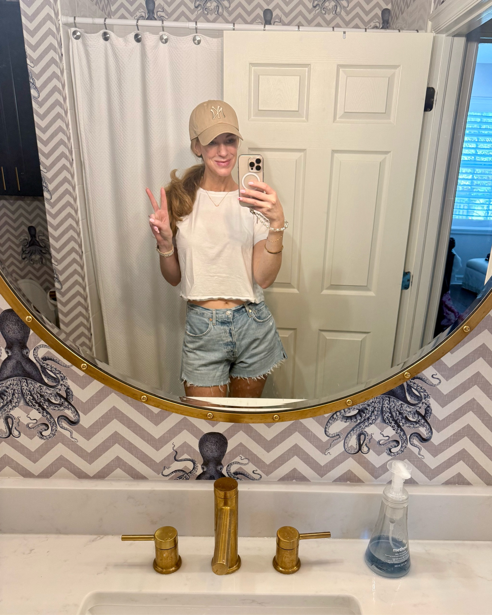 I am obsessed with this wallpaper! The cute octopus and chevron is perfect for a beach or lake house! 
Ready for a yummy breakfast in my favorite Agolde jean shorts! ✌🏻

#LTKStyleTip #LTKHome #LTKTravel