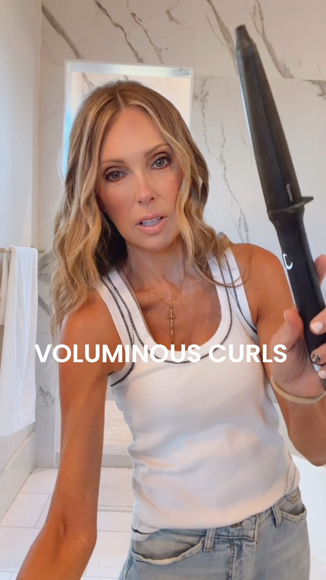 I use the tapered wand on top, spray texture spray and brush out!