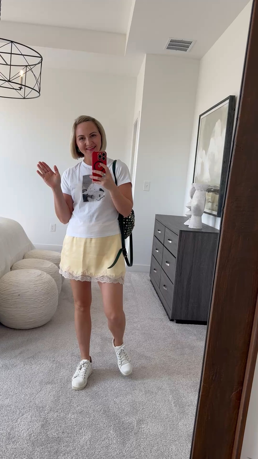 Not mad about my Dolly Parton shirt and/or this cute yellow, silky skirt! Perfect spring outfit paired with sneakers!

#LTKSeasonal #LTKPetite #LTKStyleTip