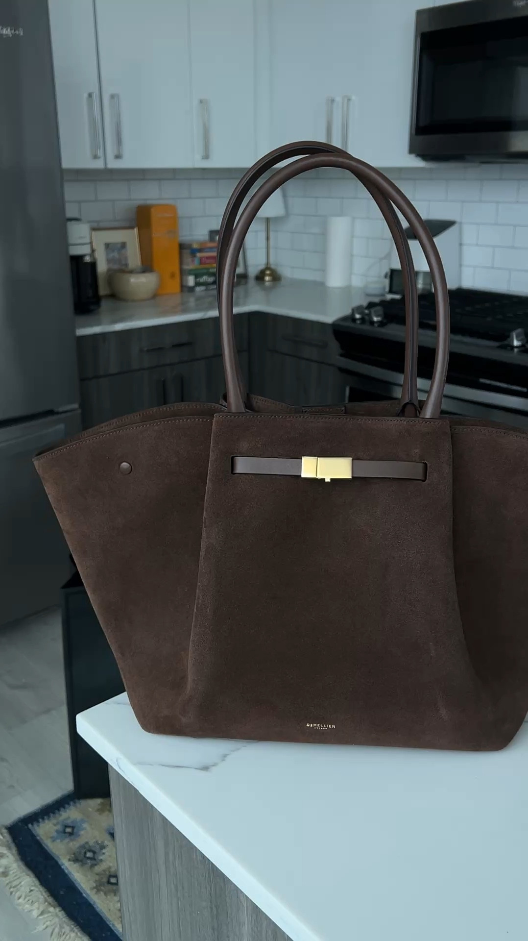 She’s here. She’s perfect. She fits my 16” laptop!!!! 🤎💻

Workbag | laptop tote | suede bag | demellier 

#LTKWorkwear #LTKGiftGuide #LTKItBag