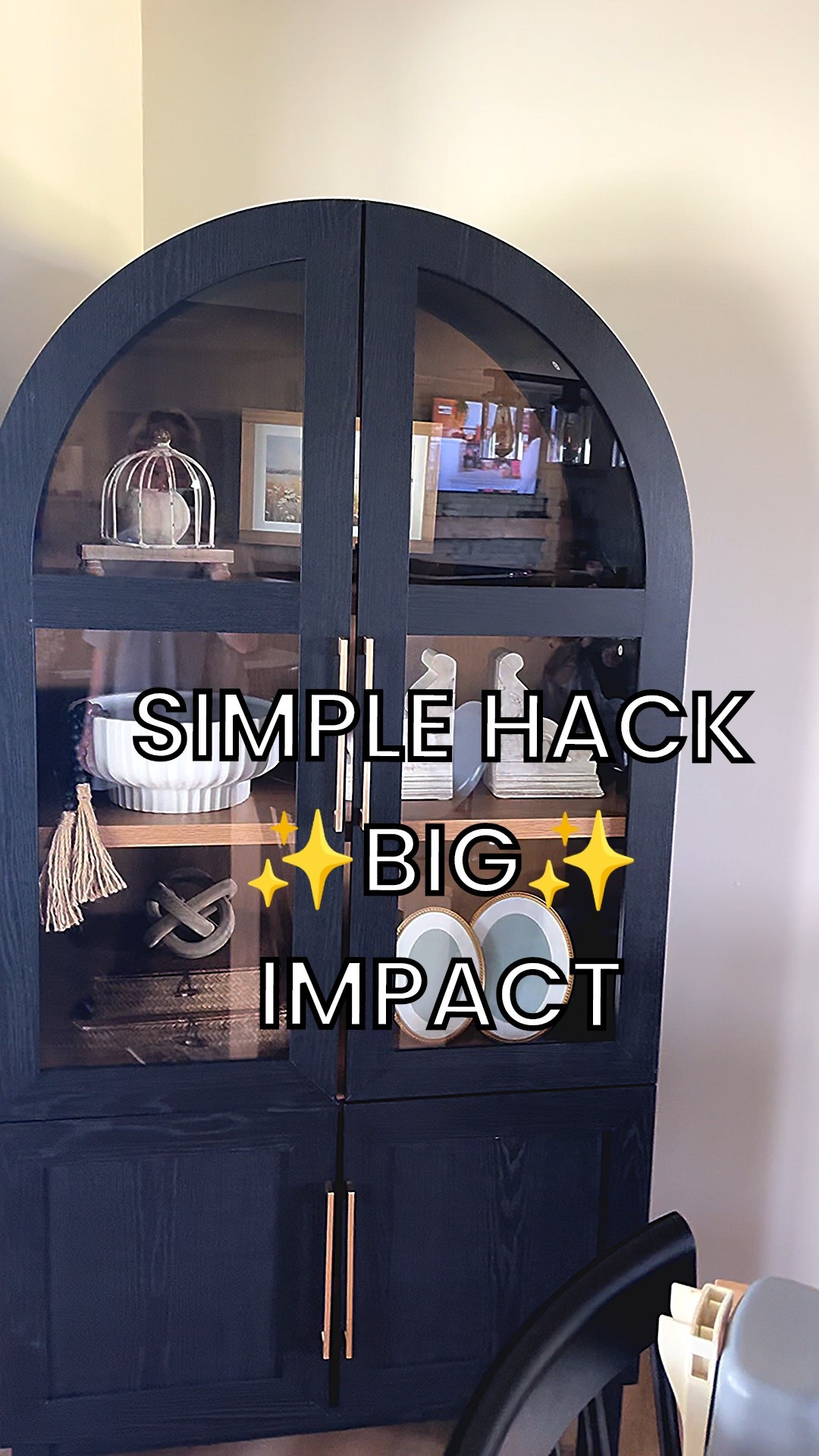 This arch cabinet got a quick upgrade with an LED strip light ✨ It makes the shelves feel styled and elevated while keeping the space warm + cozy. A simple touch that changes the whole look.

#ltkhome #cabinetdecor #homestyling #neutraldecor #cozyhome