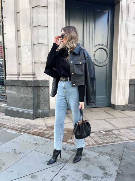 Chic outfit perfect for meetings in the city. Blue mom jeans, black heeled leather boots, black jumper, black leather jacket, black jil sander bag, ysl sunnies & Loewe belt  

#LTKSeasonal #LTKstyletip #LTKshoecrush