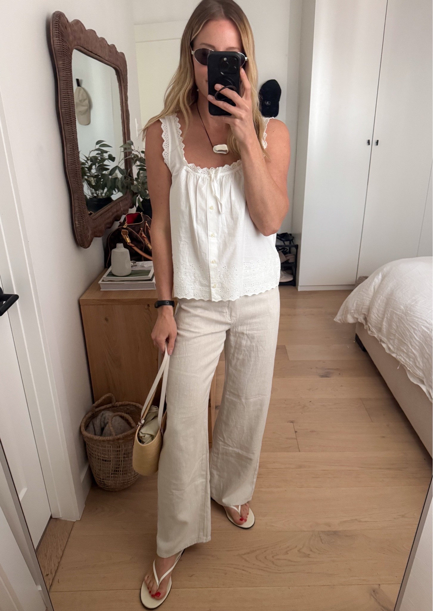 Another excellent gap find for spring/summer! The perfect embroidered cotton tank with these linen blend jeans. Paired with simple sandals and a straw bag!

#LTKcanada #LTKsummer #LTKsale