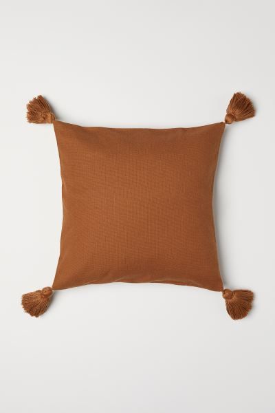 Cotton canvas cushion cover with tassels at corners. Concealed zip. | H&M (US + CA)