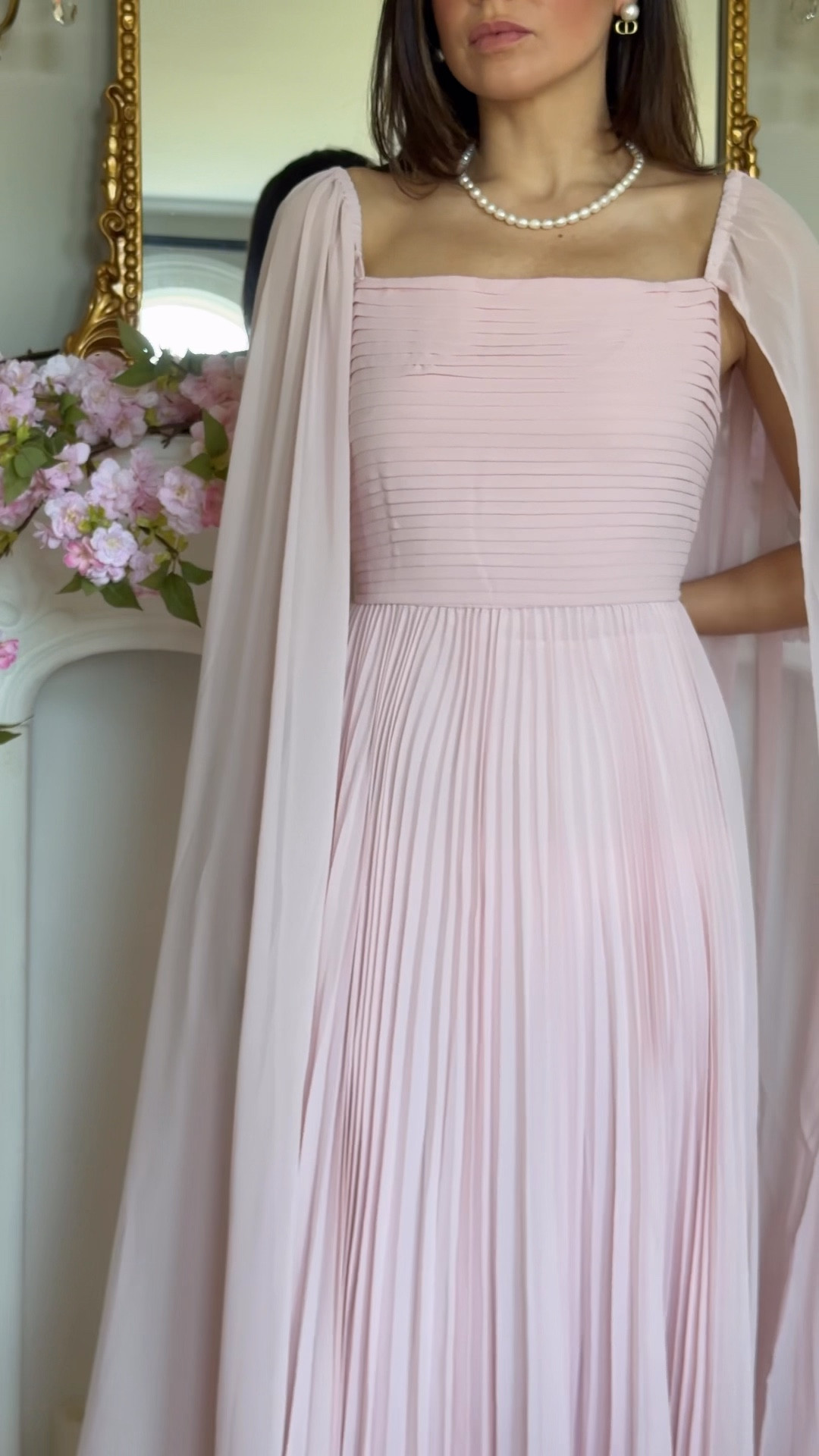 Use code: CWATTCM and save 10% off Caitlyn Minimalist jewelry. They have a very similar pearl necklace to the one I have on here. Pearl and gold earrings, French, Parisian style, dressy, wedding guest.

#LTKSaleAlert #LTKWedding