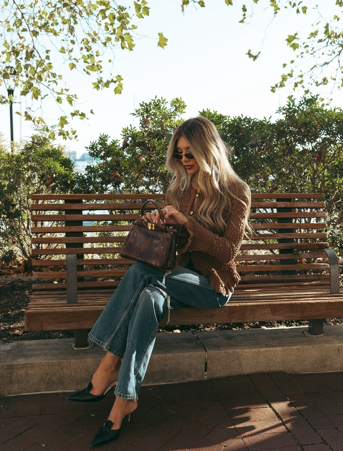 The moment I realized I left my lipgloss at home 🫥 This crocheted sweater from L’Agence is the perfect fall staple while it’s still sweater weather. Linked the exact sweater, Gucci sunnies I picked up in DC, and similar python Fendi peekaboo bag.

#LTKItBag #LTKSeasonal #LTKStyleTip