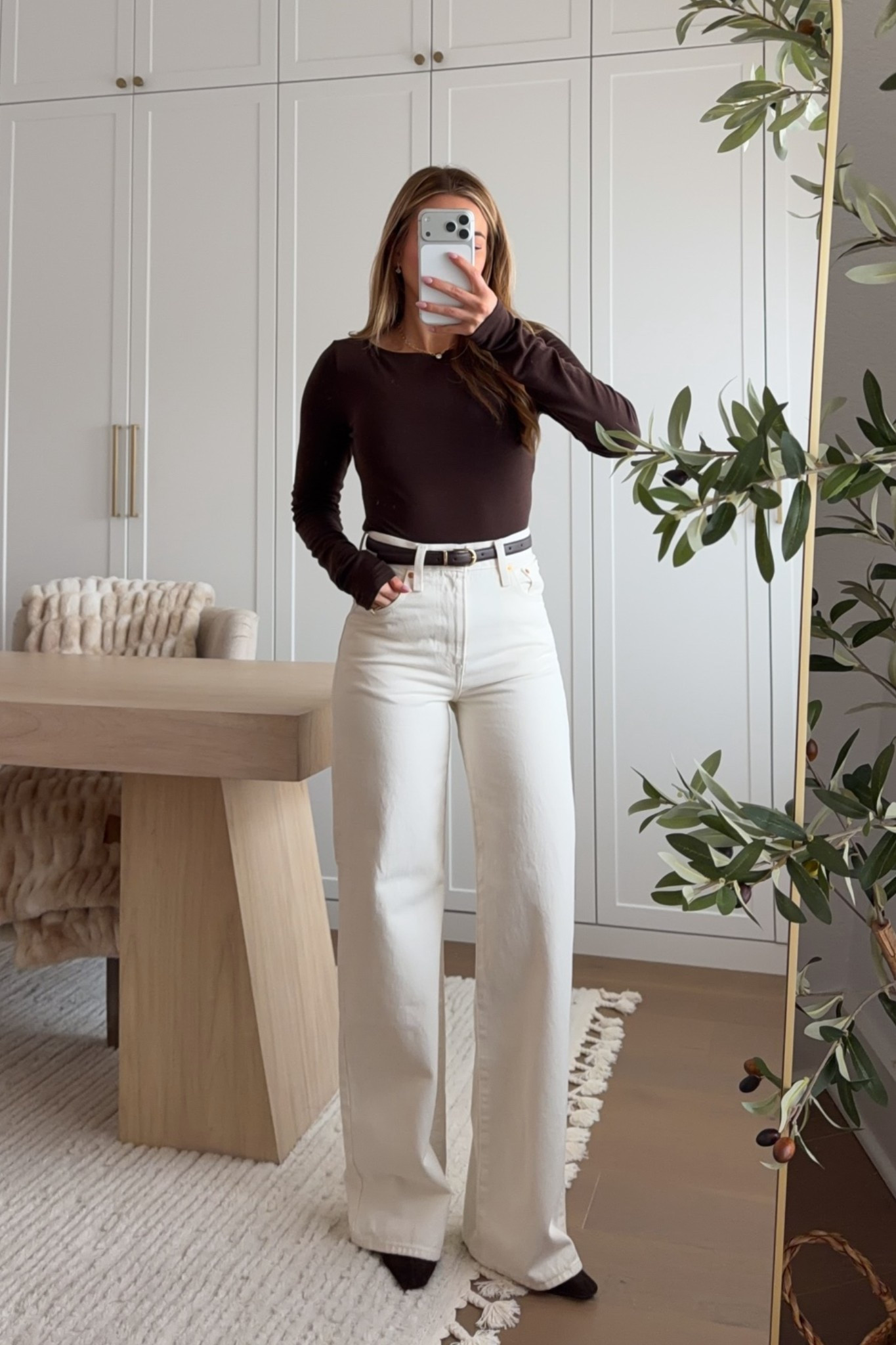 top: xs // jeans: 24 regular — can’t go wrong with this merino wool long sleeve and off-white denim for fall.