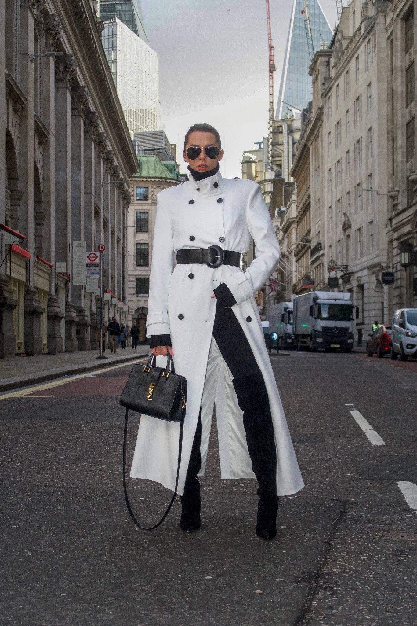 - White long trench coat with black belt

#LTKSeasonal #LTKworkwear #LTKFind