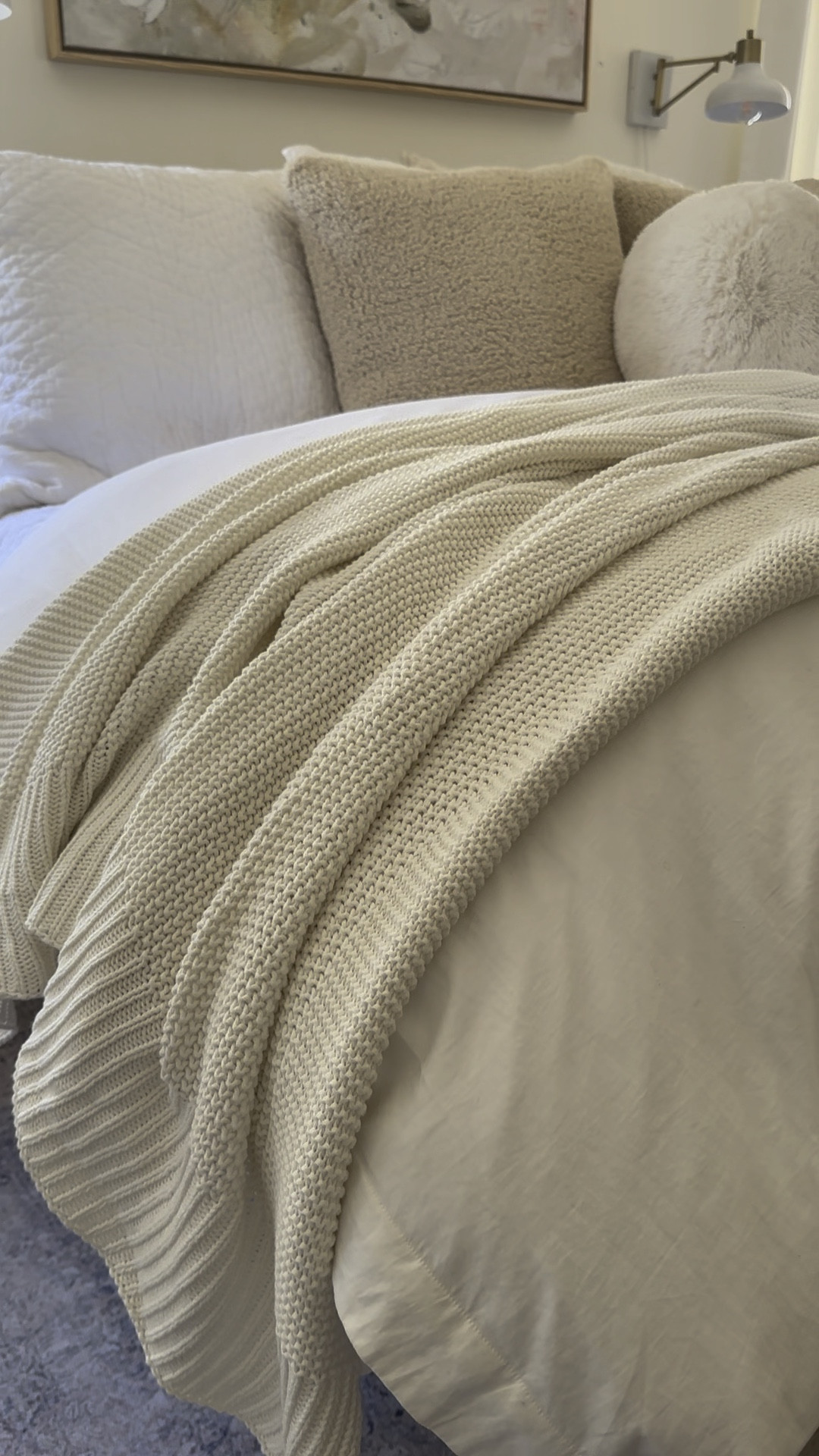 Spring bedding // cozy bedroom // Loving this new knit throw from Walmart -perfect for spring (light weight and pretty warm white) 

#LTKhome #LTKVideo #LTKfindsunder50
