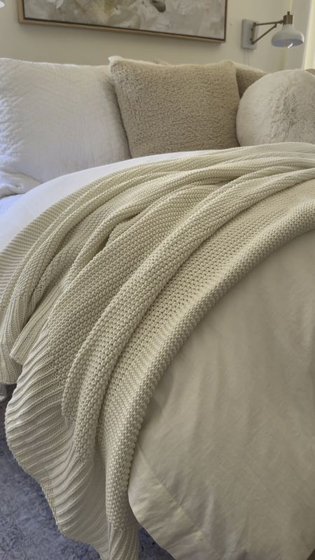 Spring bedding // cozy bedroom // Loving this new knit throw from Walmart -perfect for spring (light weight and pretty warm white) 

#LTKhome #LTKVideo #LTKfindsunder50
