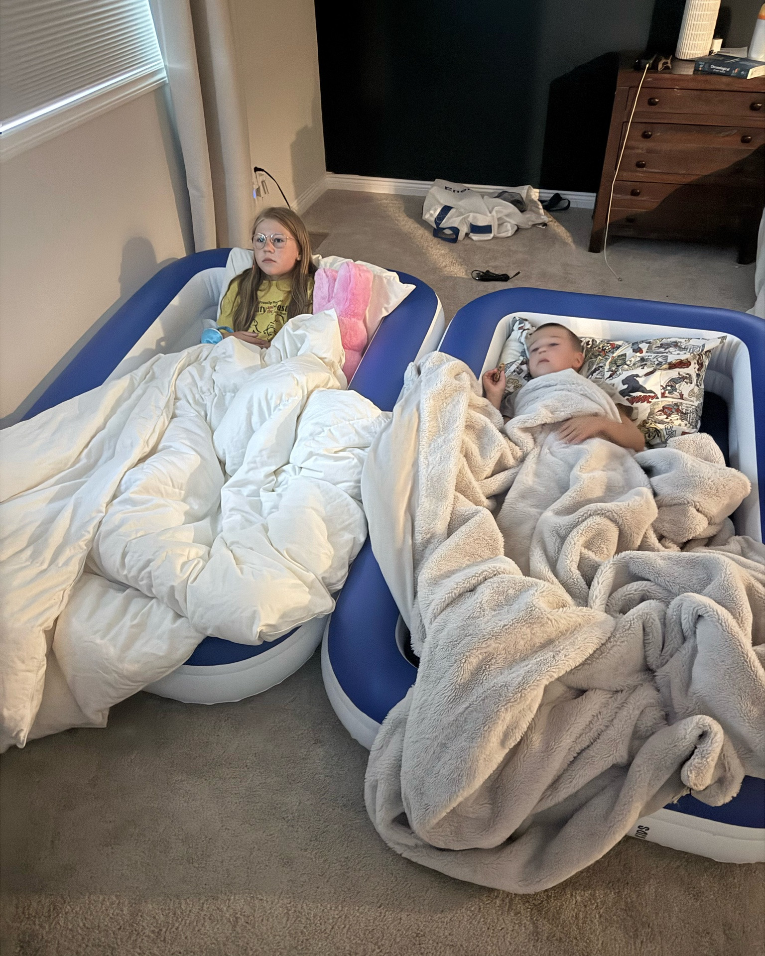 We have had these blow up beds for the kids since they were 4 and 2 and they still fit at 8.5 and 6... theyre so easy for travel and come with a carry bag and mini electric pump!

#LTKmomlife #LTKKids #LTKTravel