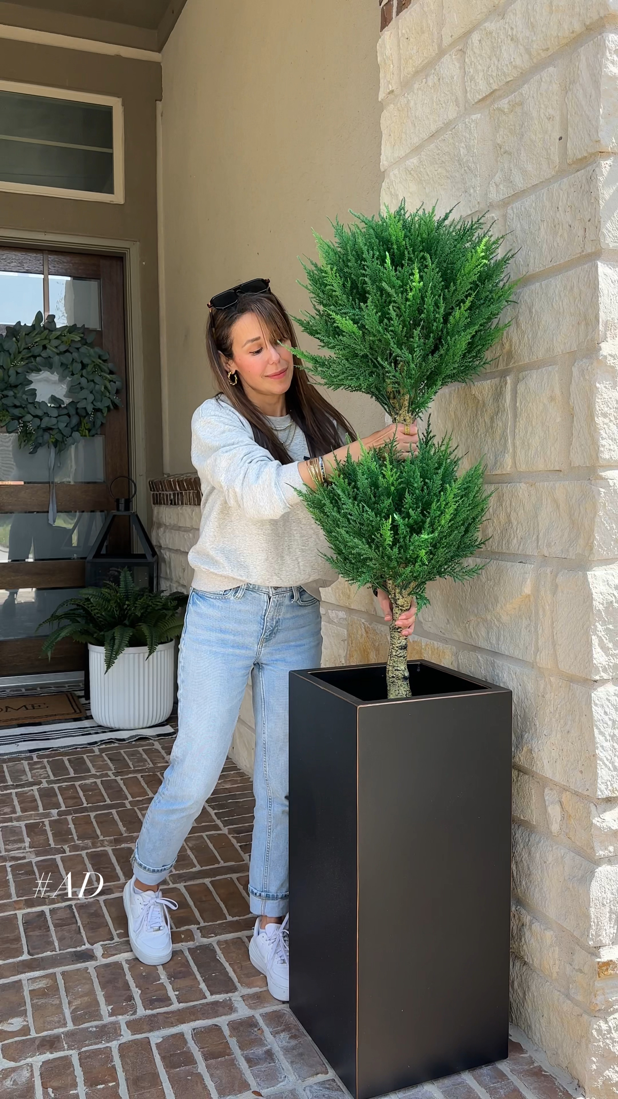 #ad Spring porch refresh 🌿 Partnering with @loweshomeimprovement to bring that faux greenery to life! These stunning faux topiaries are porch-perfect! One of my favorite things to do for spring is refresh my porch and I have to say I love how it turned out! Theses topiary’s are UV rated making them perfect for any outdoor area of  your home! #Lowespartner #@loweshomeimprovement

#LTKVideo #LTKSeasonal #LTKhome