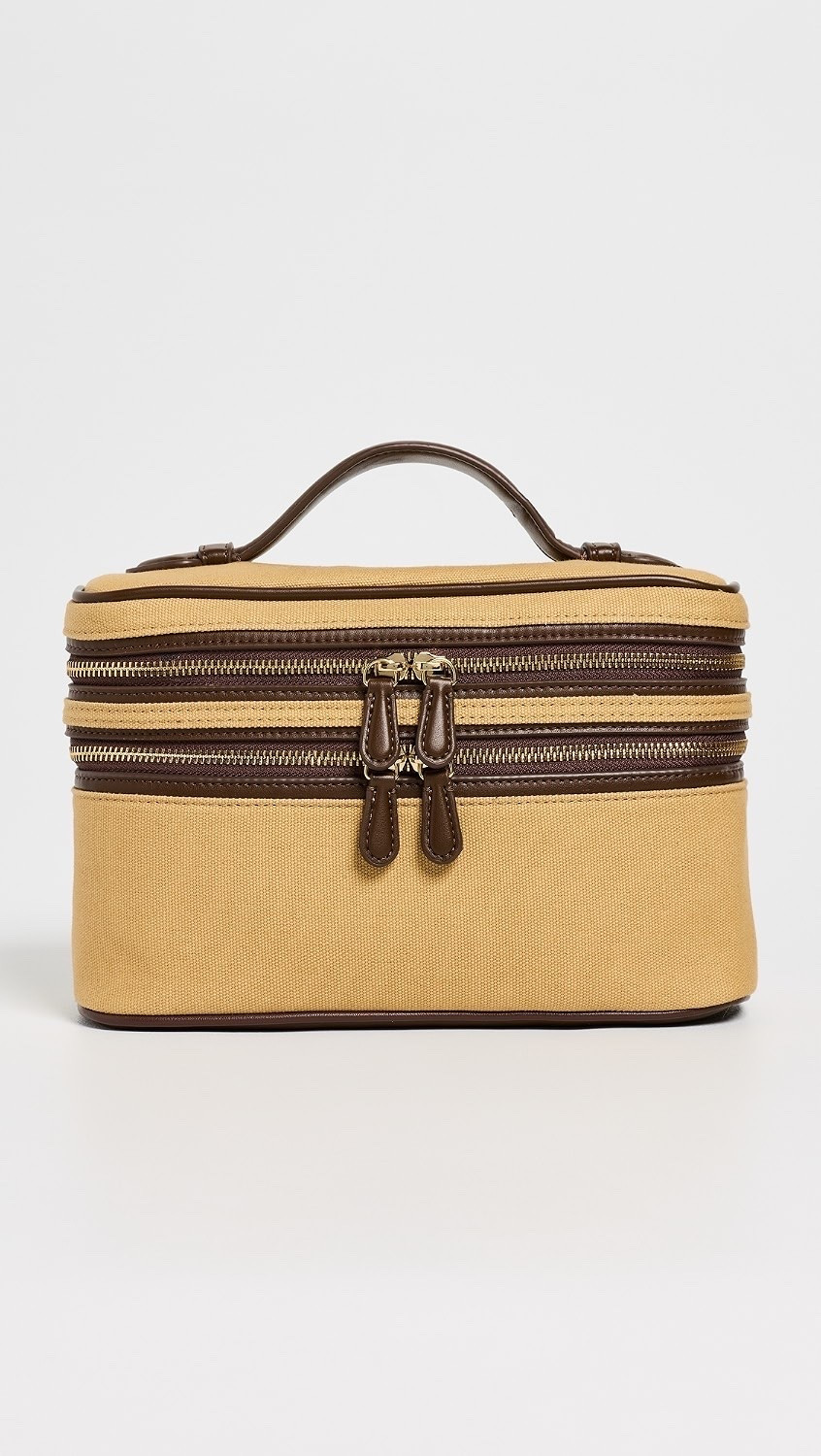 Stoney Clover Lane
Double Zip Vanity Bag

This vanity bag from Stoney Clover Lane is made from canvas and features faux leather trim, gold-tone hardware, and multiple interior pockets.

#LTKootd #LTKmomlife #LTKTravel