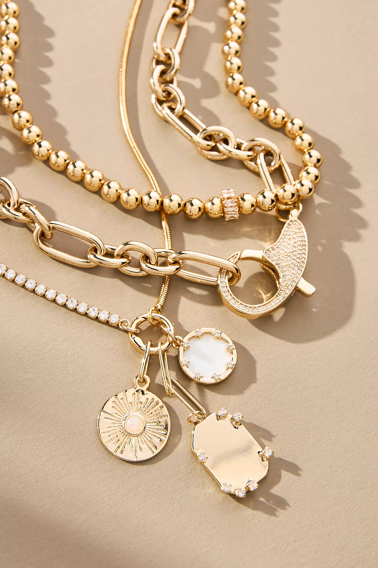 Shades of Sea Layered Necklaces: Charm Edition | Anthropologie (US)