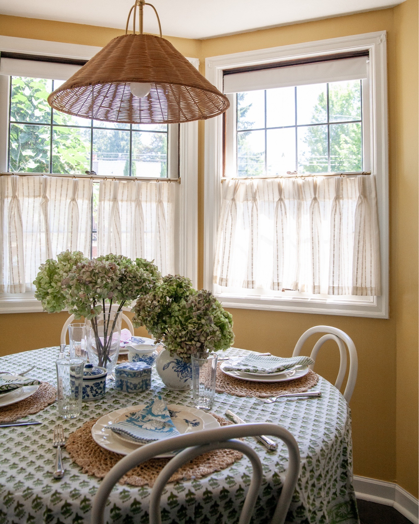 Earlier this year I started setting the table with a pretty table setting, even just for a Friday afternoon snack or Saturday lunch with the kids. It was for me really, trying to make everyday life prettier, but it turns out the kids love it! “Fancy lunch,” Lucy calls it.

I haven’t had any tablecloths for this table yet, but I found this beautiful imported cotton block print seller that makes them in every size and shape, isn’t this one perfect in here?!

P.S. Have you tried drying your hydrangeas yet? My favorite method is to put them in a vase with 1 to 2 inches of water and just wait till it evaporates. You can honestly keep dried hydrangeas for years, although I tend to replace them every year at this time! ￼

#LTKHome
