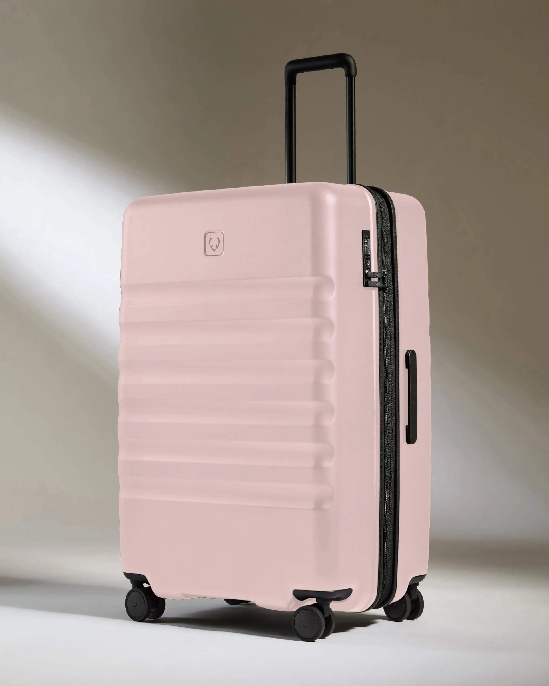 Large Suitcase in Pink - Icon Stripe | Lightweight & Hard Shell Suitcase | Antler UK