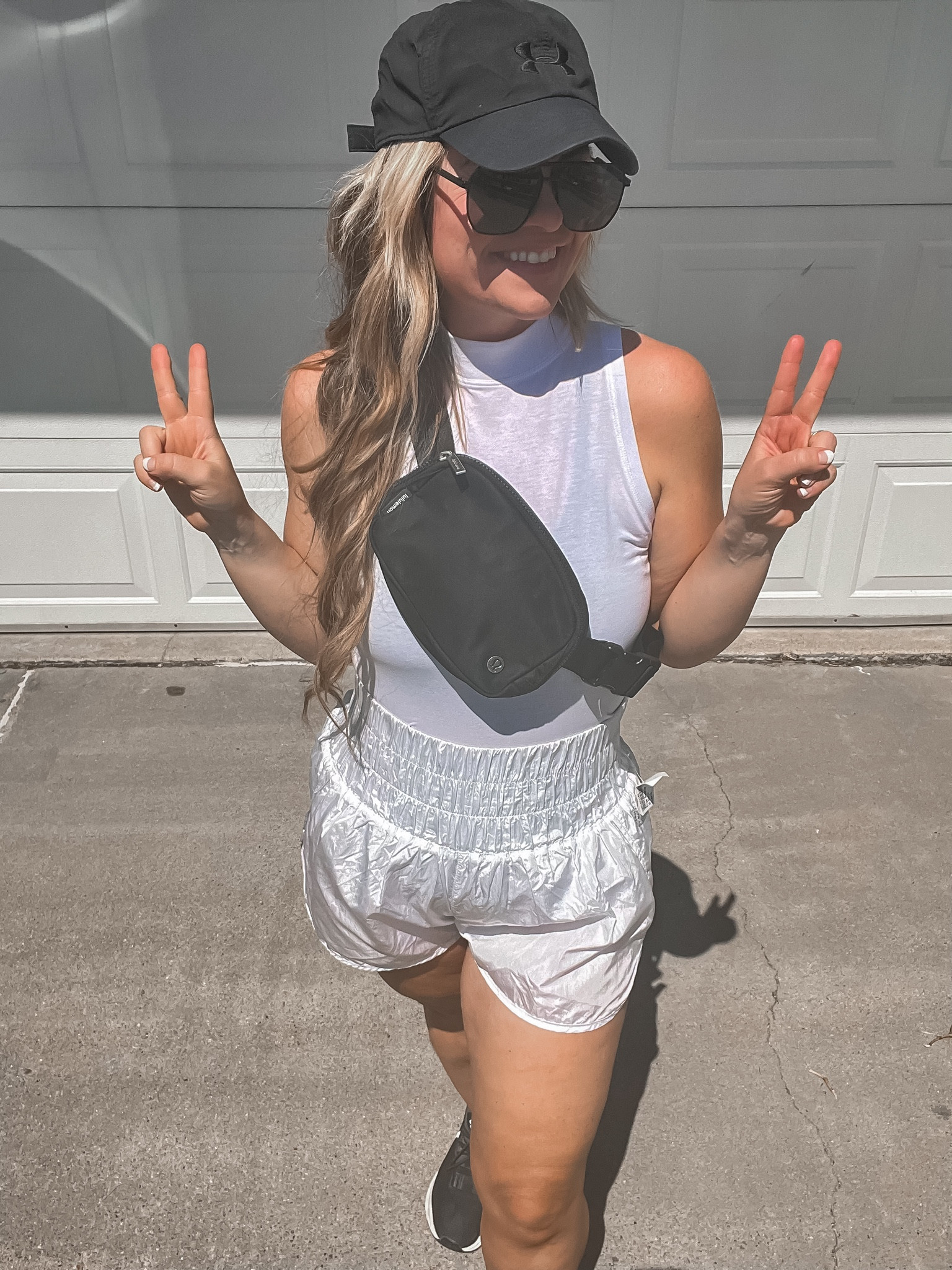 Free people shorts these are a size large.

I love how These shorts cinch you in! They are incredibly flattering for moms. They are full coverage and they have a cinch factor that pulls everything in and keeps everything where we want it! 

Size up to a large or extra large for more coverage and no pinching! 

I love a good mock neck to dress up and casual look. It adds so edge and polish. 

LuluLemon belt bag.

Casual summer outfit ideas 

#LTKstyletip #LTKfitness #LTKActive