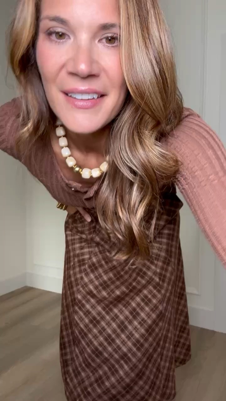 Okay, this might be my favorite fall color combo yet. The chocolate tones, plaid midi skirt and tall boots all work so well together without feeling too dressy.

Fall outfit, Plaid midi skirt, Brown outfit, Tall boots, Fall skirt outfit, Tall girl fashion, Midi skirt outfit, Sweater top, Fall date night, Autumn style, Tall girl outfit, StangandCo

#LTKootd #LTKSeasonal #LTKTall