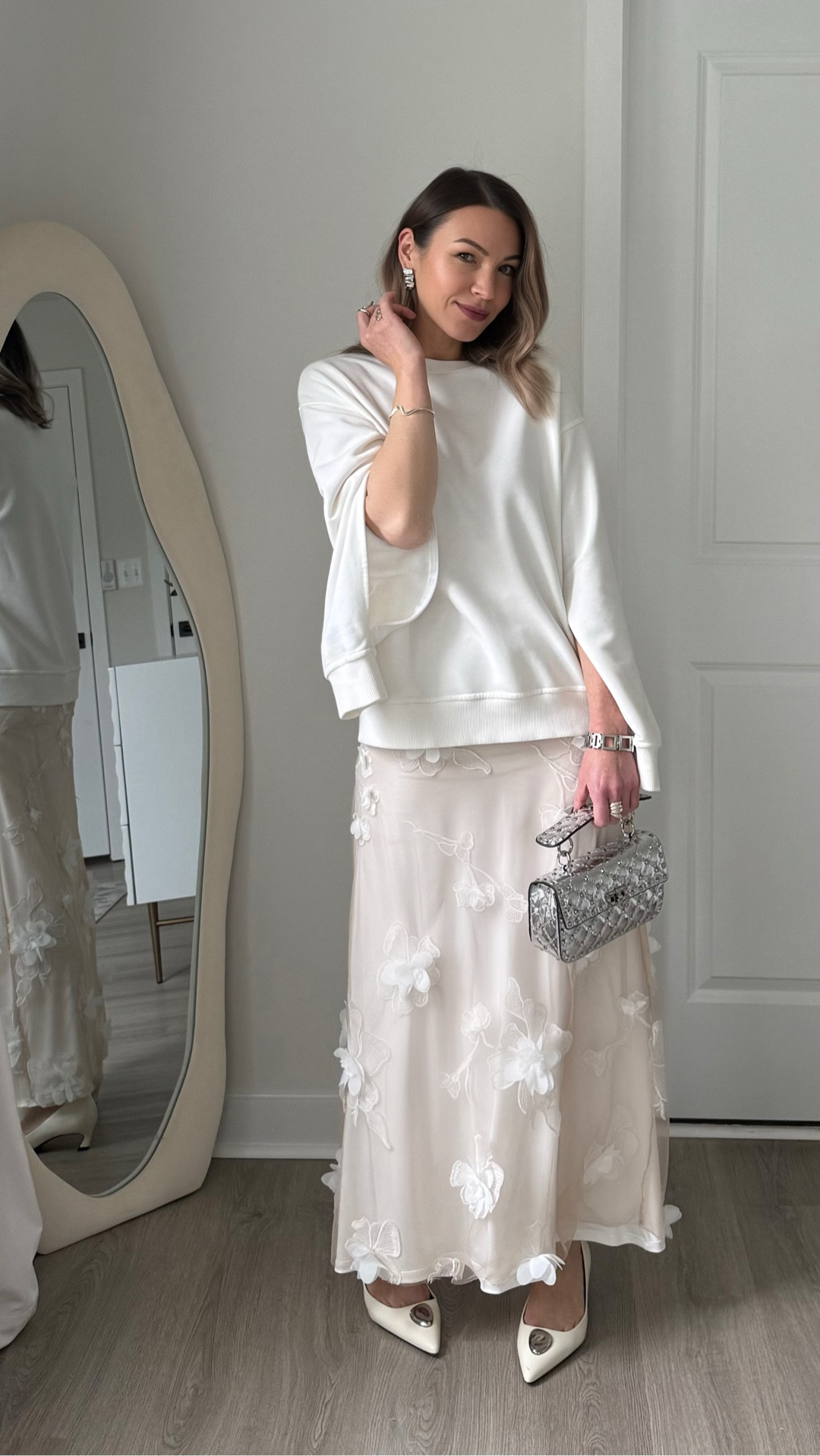Getting inspired by spring 2026 trends: white, some blush hues and a little bit of floral appliques🤍

Linking my skirt and similar items below!

#LTKSeasonal #LTKootd #LTKOver40
