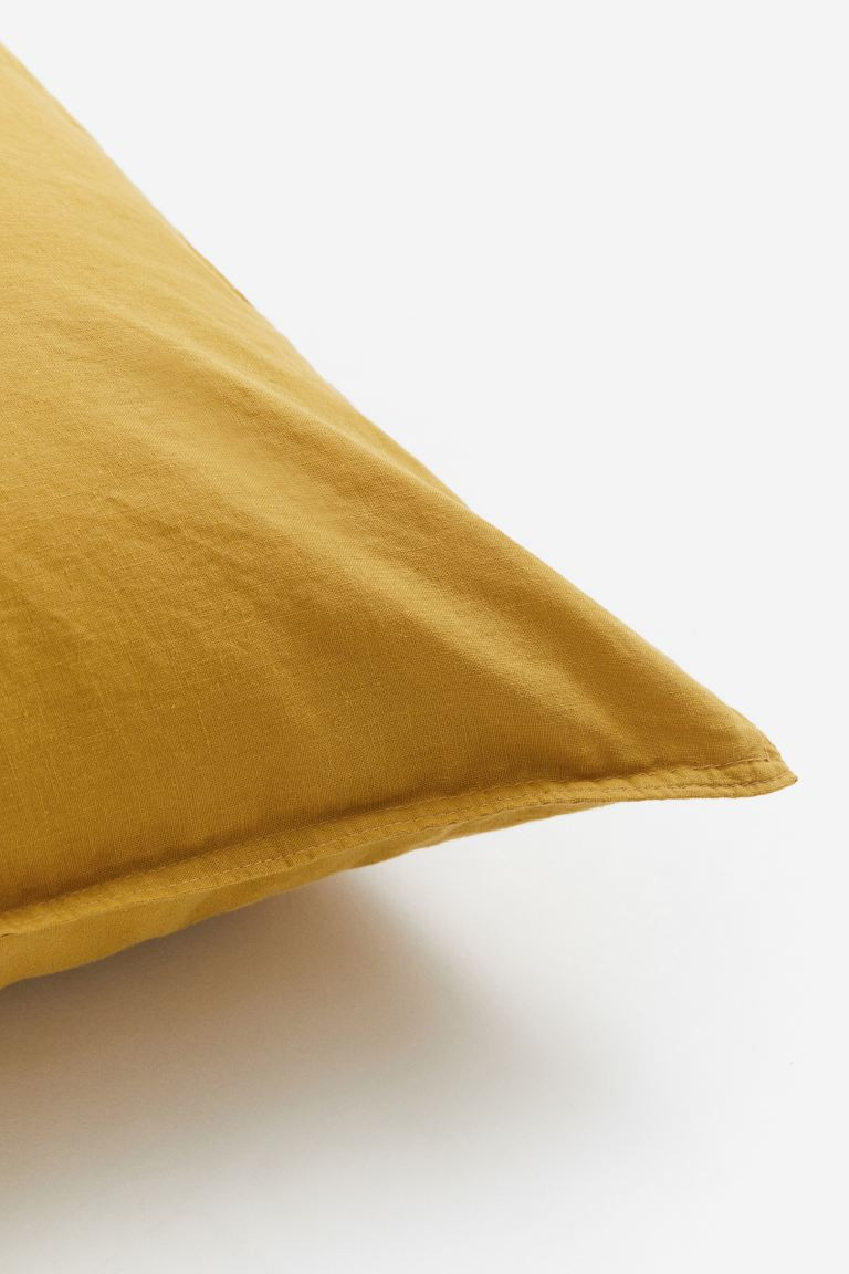 Washed linen-blend pillowcase - Dark yellow - Home All | H&M GB | H&M (UK, MY, IN, SG, PH, TW, HK)