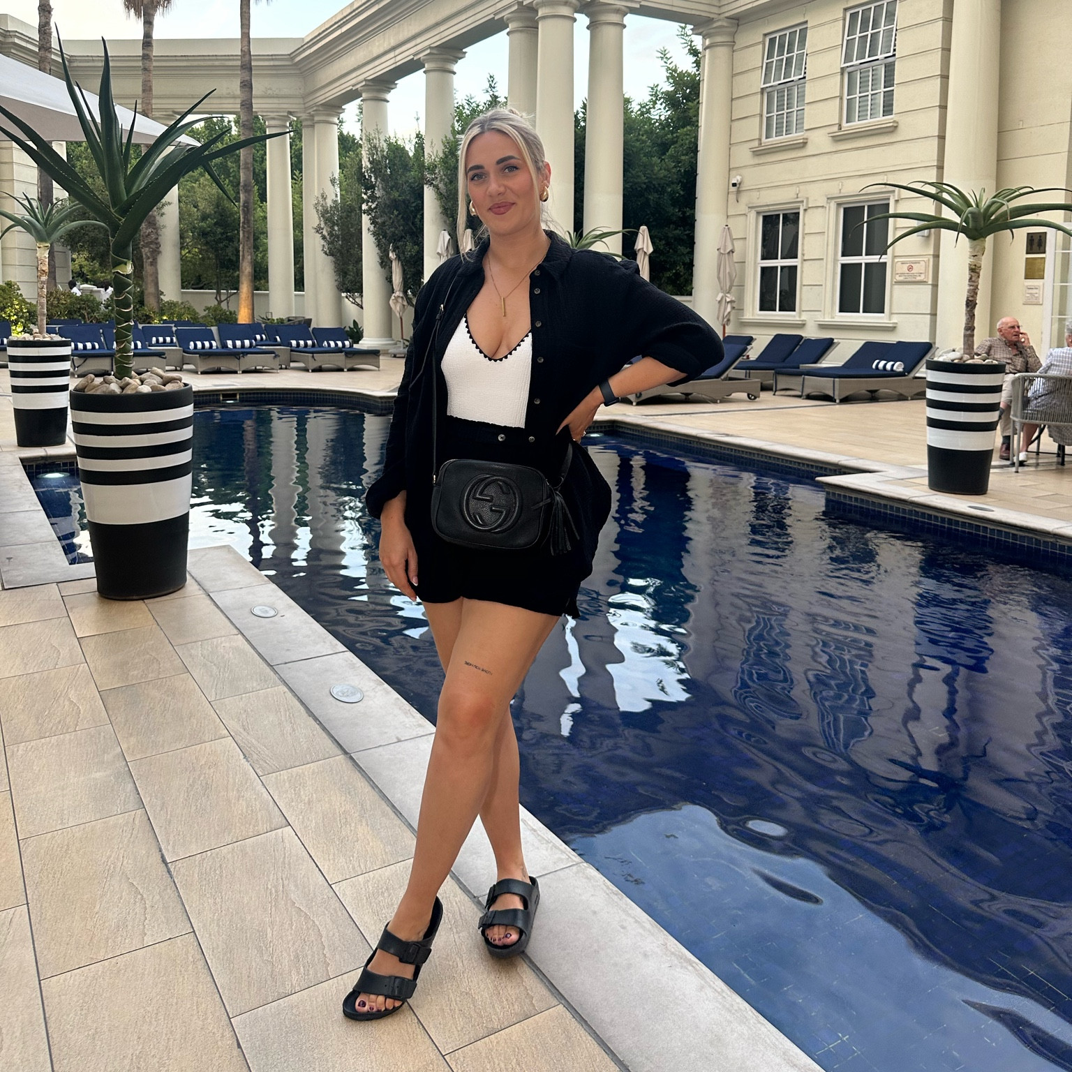 Textured black co-ord with trending white swimsuit with a black trim worn as a bodysuit paired with Birkenstock sandals and black Gucci bag.

Perfect holiday or summers evening elevated casual wear for drinks and dinner.

Shirt, Shorts & Swimsuit size 12


#LTKtravel #LTKswim #LTKeurope