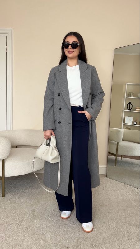 Winter to Spring transitional outfit with navy trousers. Jumper is from M&S, wearing size UK10. Coat is from Monsoon, wearing size UK10. Trousers are from &OtherStories, wearing size UK10. 

#LTKfindsunder100 #LTKstyletip #LTKeurope